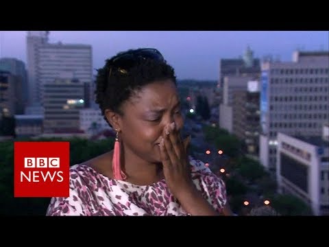 Mugabe resigns: activist breaks down in tears of Joy - BBC News