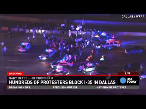 &#039;Hands up, don&#039;t shoot&#039; protests sweep nation
