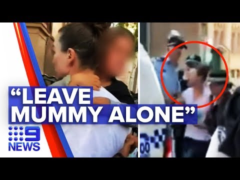 Coronavirus: Mother ripped away from son during protest | Nine News Australia