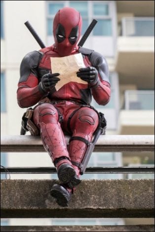 Ryan Reynolds's Deadpool relaxes before a battle.