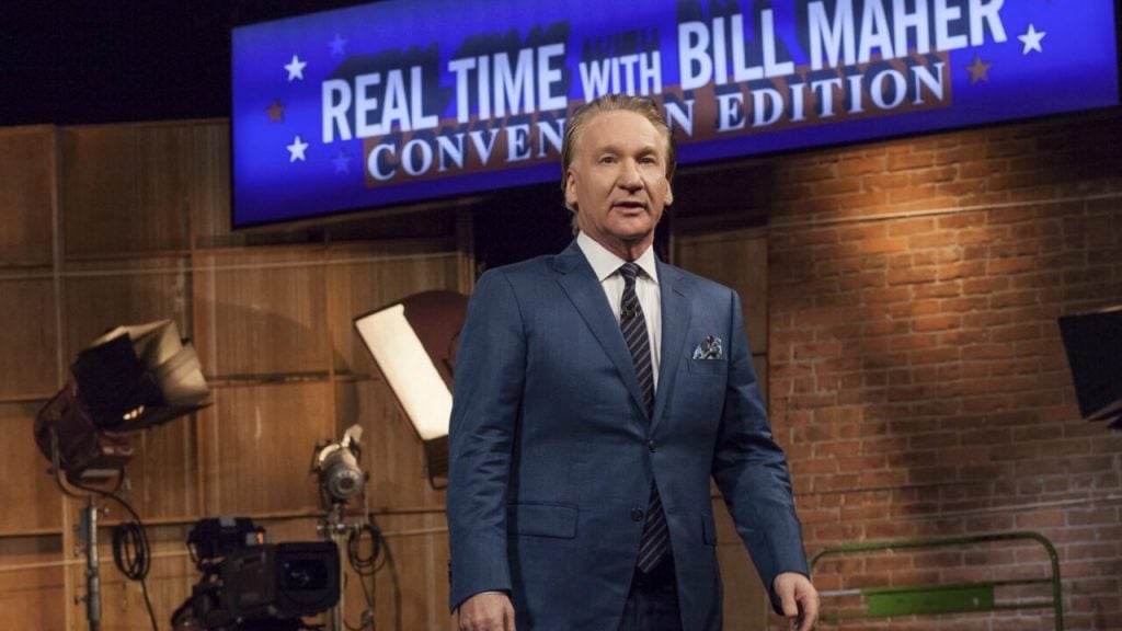 Bill Maher in a suit