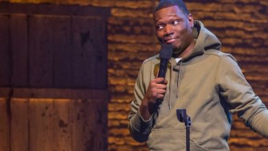 Michael Che on stage