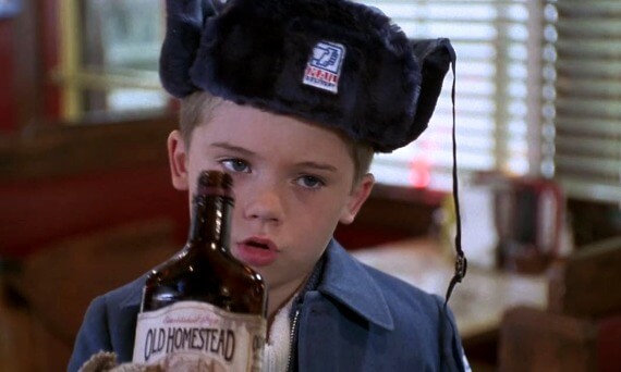 A little boy wearing a hat in Jingle All the Way