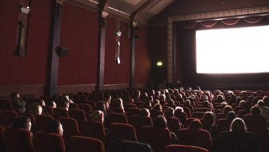 A crowd of people in a movie theater