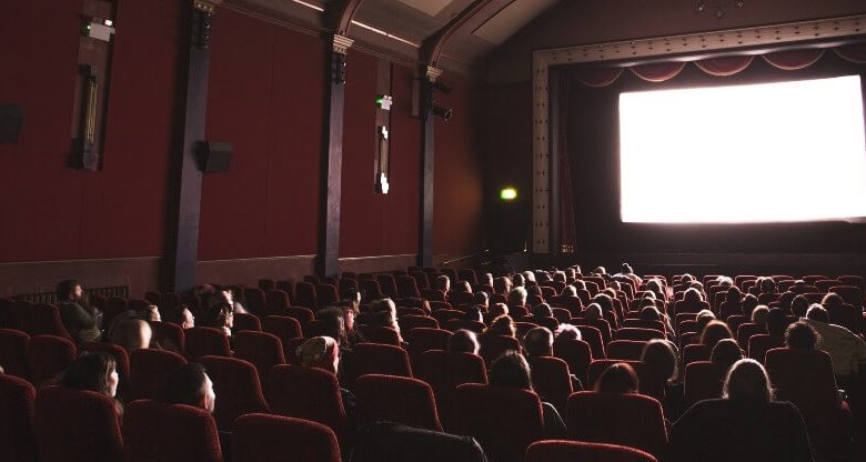 A crowd of people in a movie theater