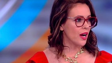 Alyssa Milano wearing glasses