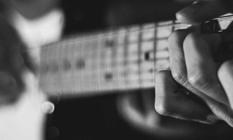 A blurry image of a guitar