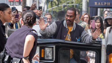 Beverly Hills Cop Axel F review Eddie Murphy hands up