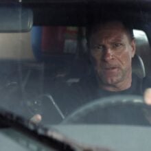 MUZZLE CITY OF WOLVES - review Aaron Eckhart