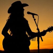 Silouette of female country singer-