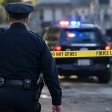 Police officer approaching crime scene