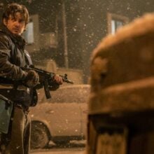 Resident Evil review Austin Abrams with rifle-
