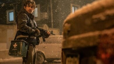 Resident Evil review Austin Abrams with rifle-